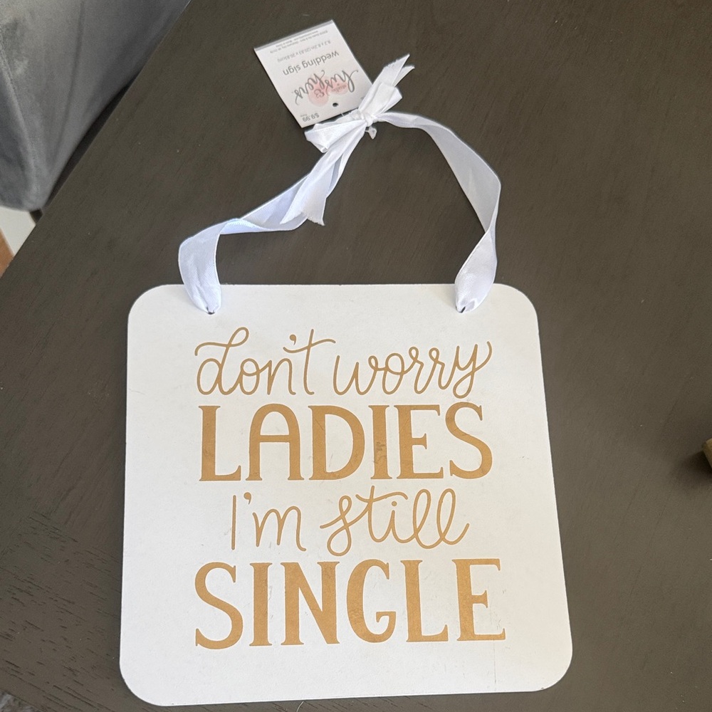 White and Gold Decorative Sign